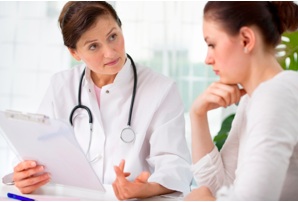 Feritity doctor talking to patient about PCOS